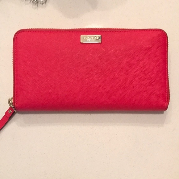 kate spade Handbags - Like new Kate spade zip wallet pink
